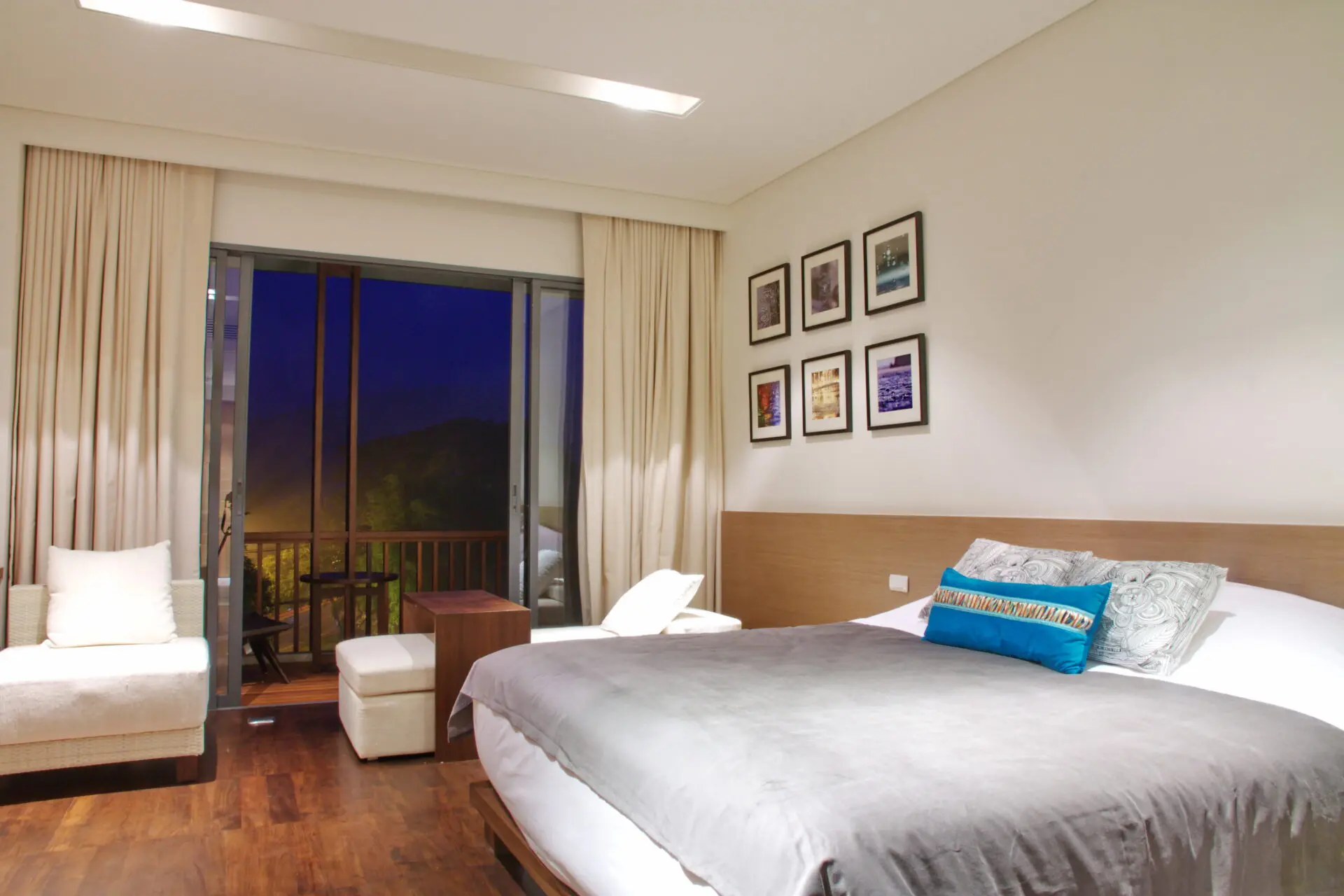 Inviting Comfy Studio interior capturing natural light and scenic mountain landscapes for a restful Chiang Mai stay.