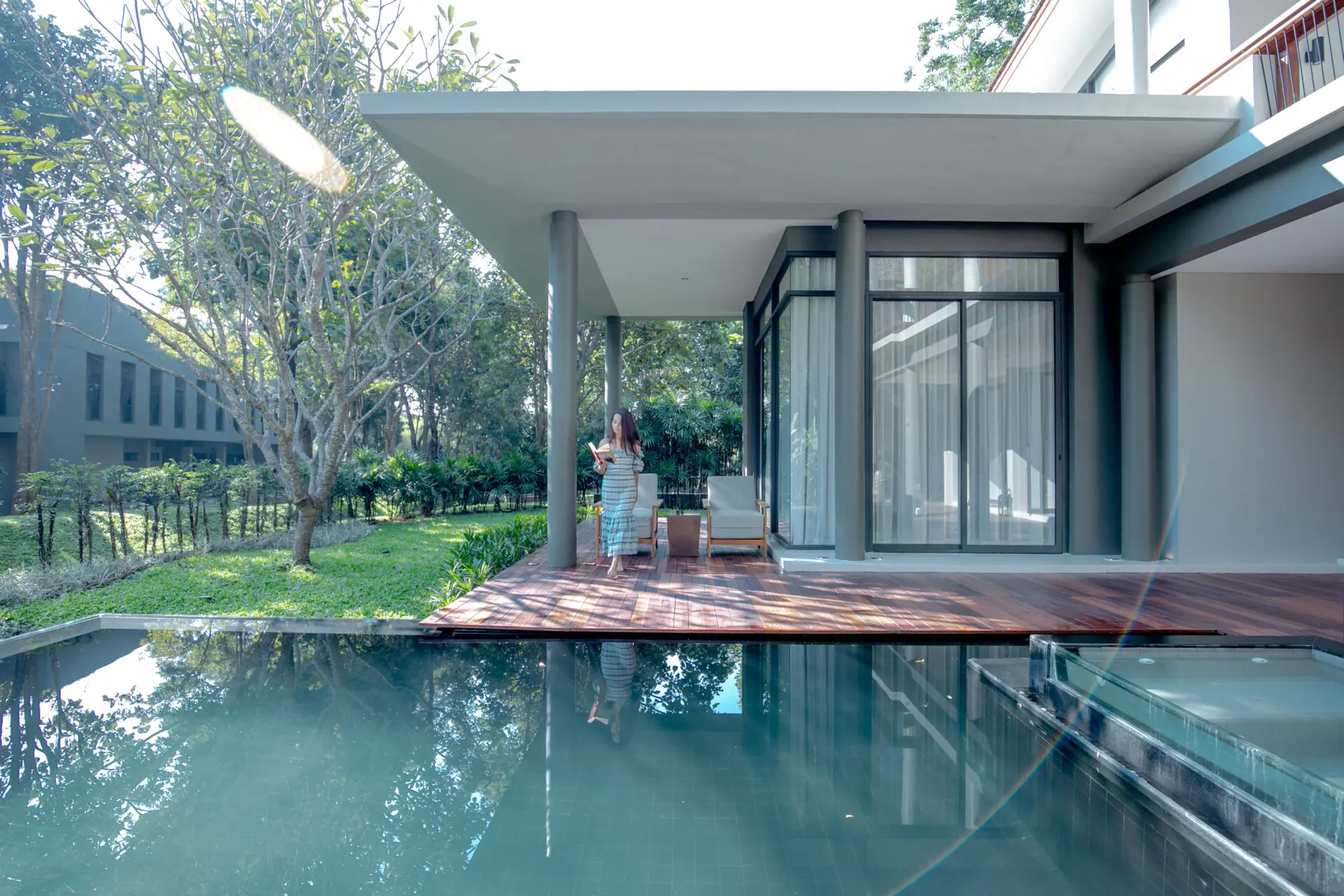 Outdoor pool deck with comfortable lounge seating for relaxing throughout the day.
