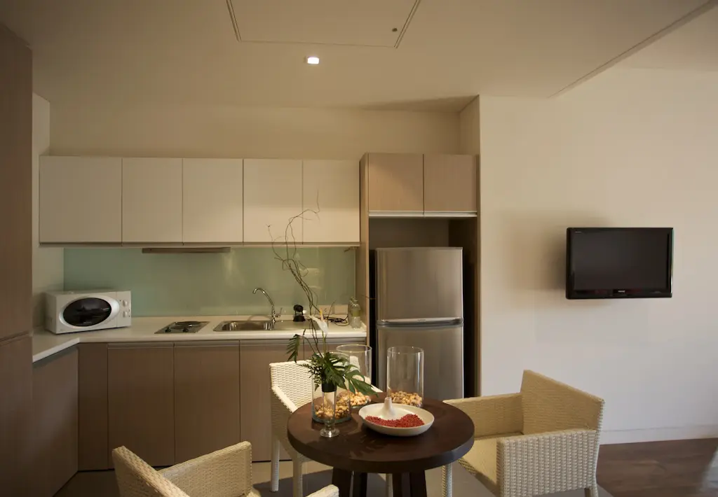 Elegant dining corner perfect for intimate meals inside the 1-bedroom luxury suite.