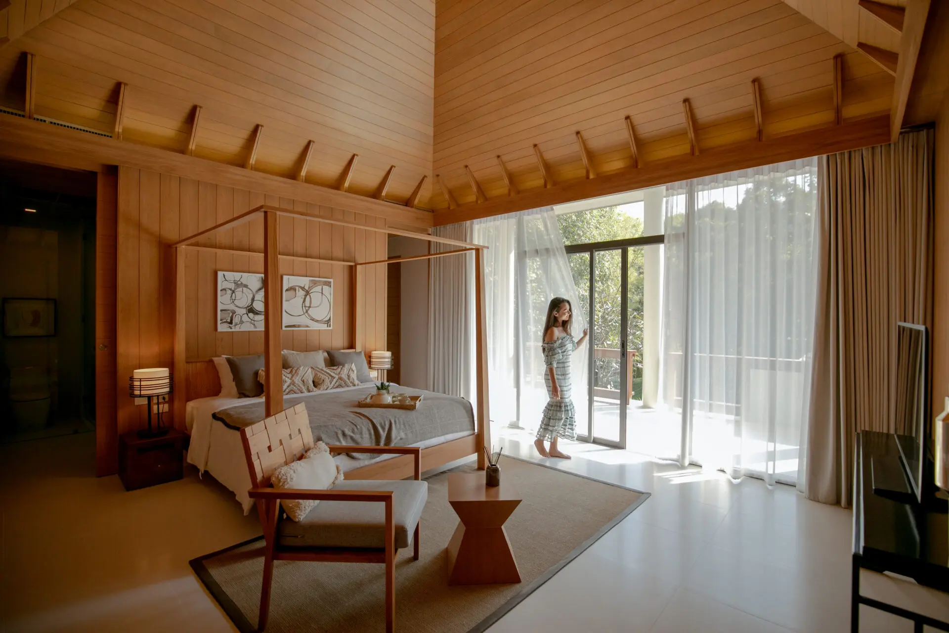 Private pool surrounded by lush greenery, creating a tranquil and refreshing villa experience.