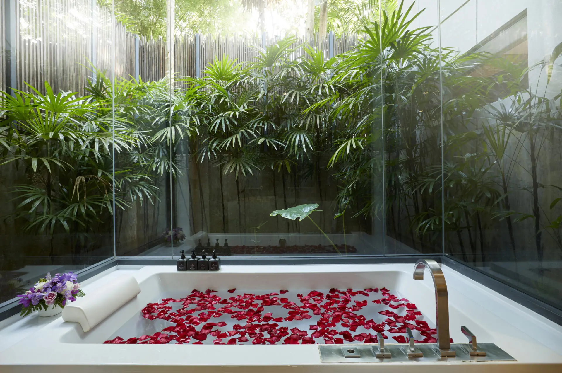 Spacious pavilion bedroom with refined décor and calming nature views.