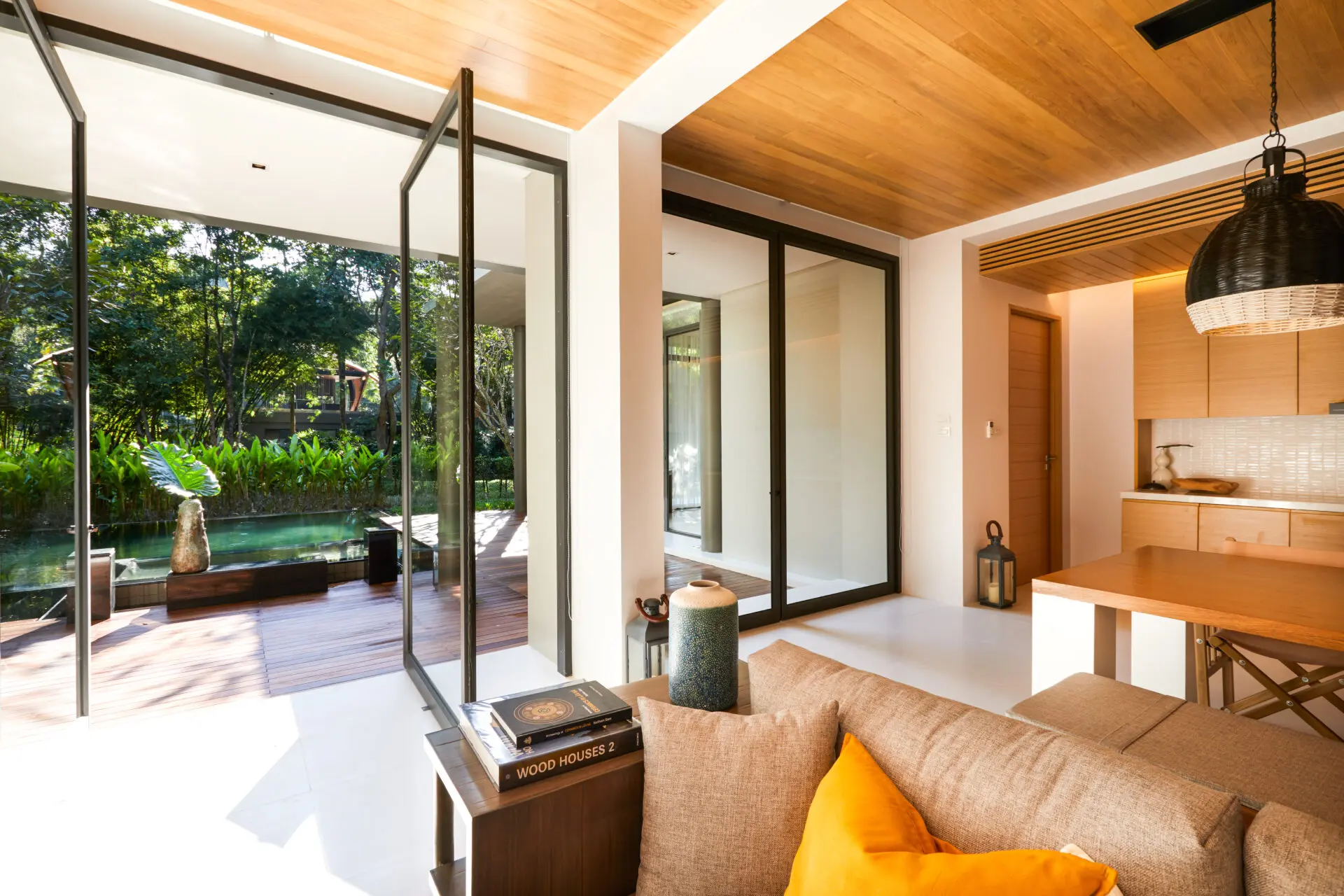 Elegant master bedroom with premium bedding and serene views of the surrounding resort landscape.