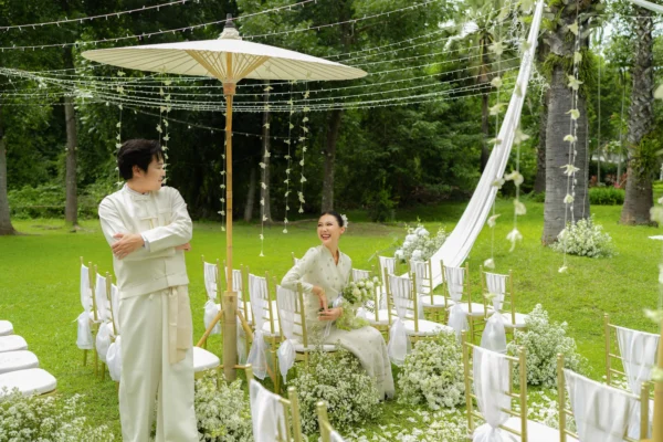 Bride and groom in Lanna attire at Veranda High Resort Chiang Mai.