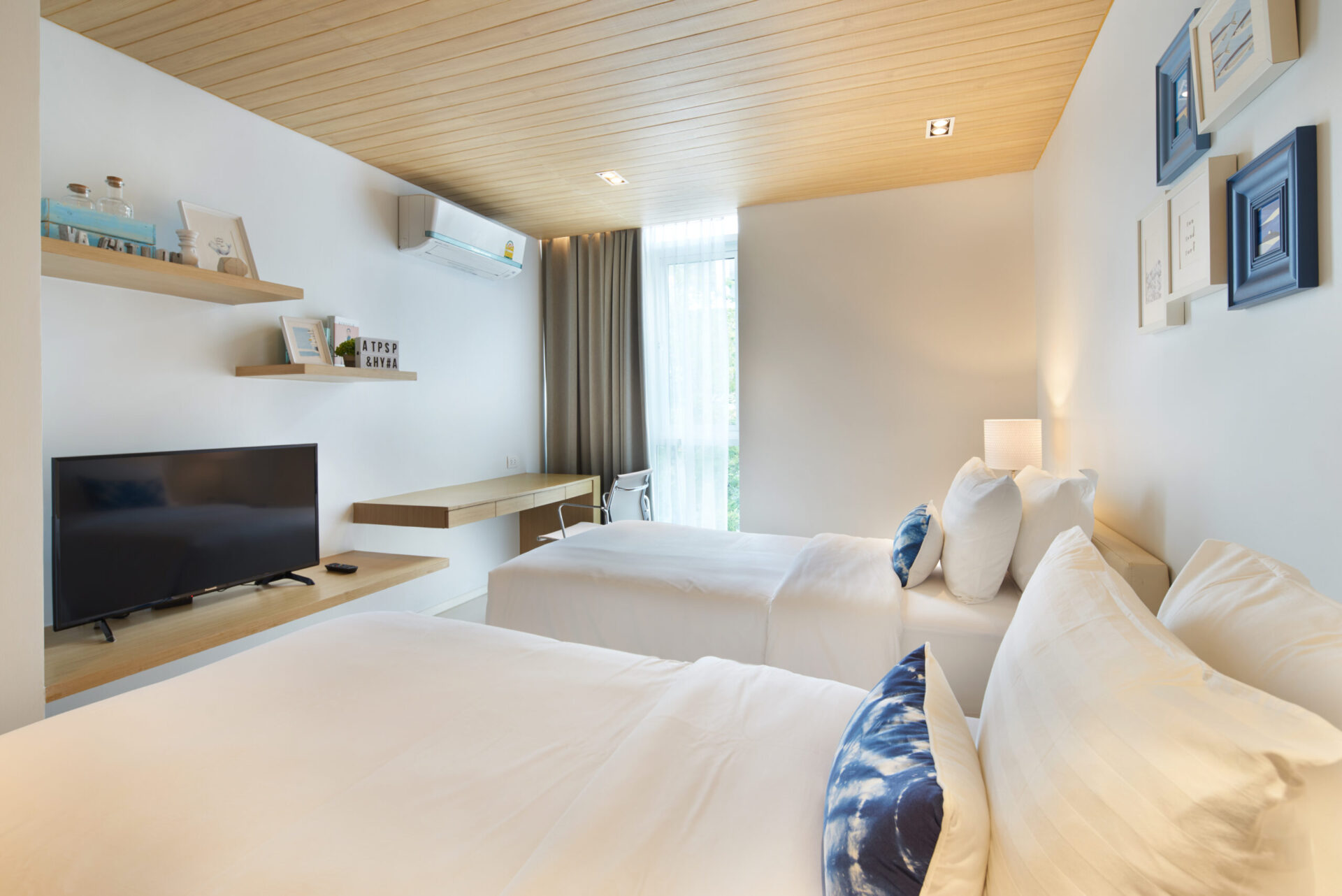 Elegant bathroom with modern fixtures and clean design within the 3-bedroom pool villa.