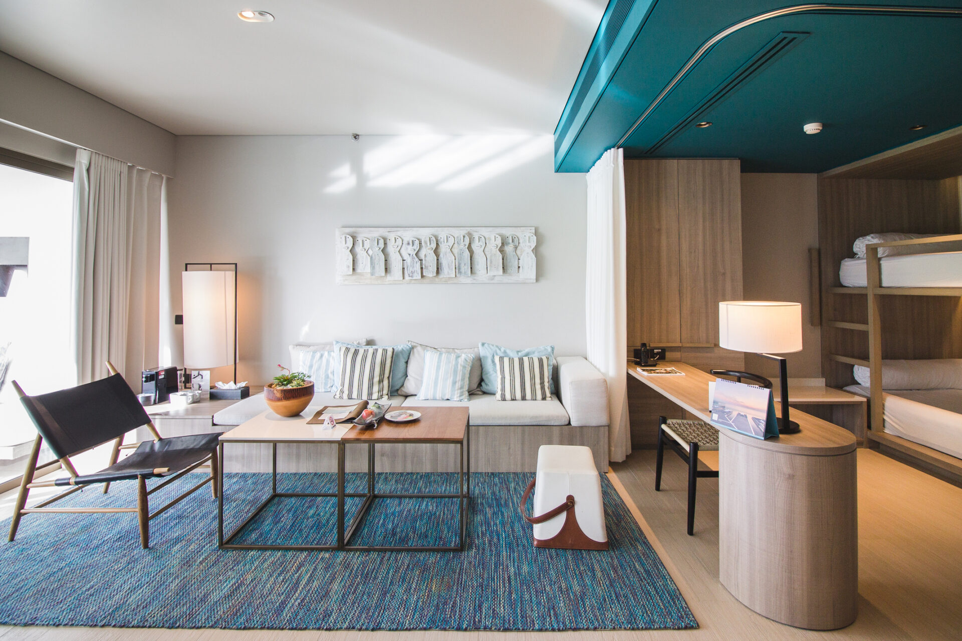 Private pool suite with refined design details and comfortable bedding, perfect for families in Na Jomtien.