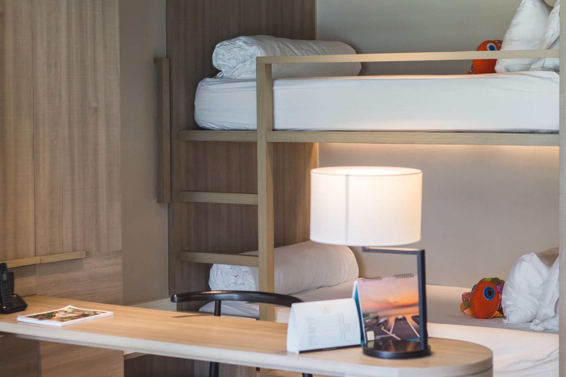 Modern pool suite showcasing chic décor and a tranquil outdoor pool designed for up to 4 guests.