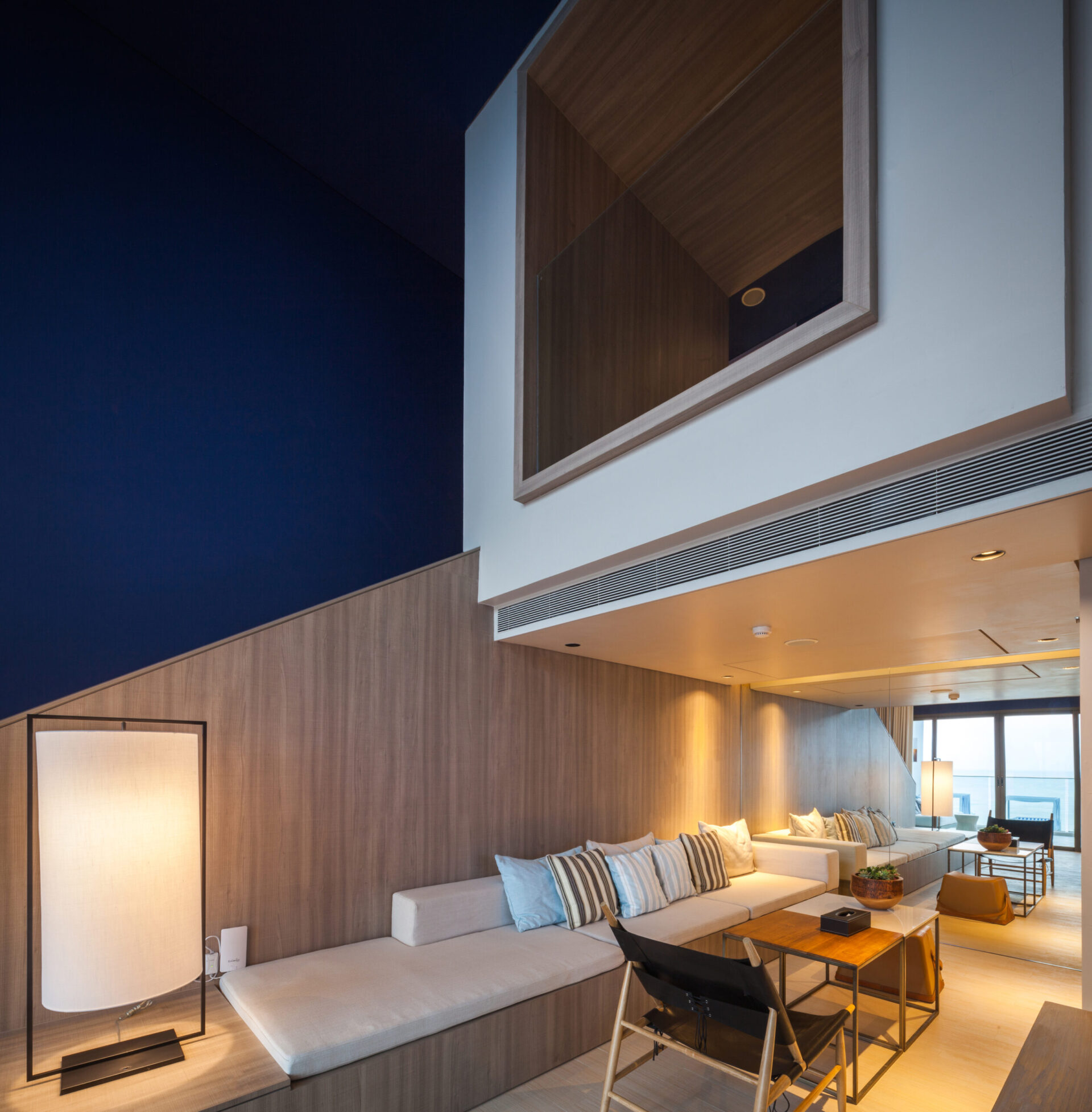 Cozy seating area inside the villa with refined décor and a relaxing sea-facing ambience.