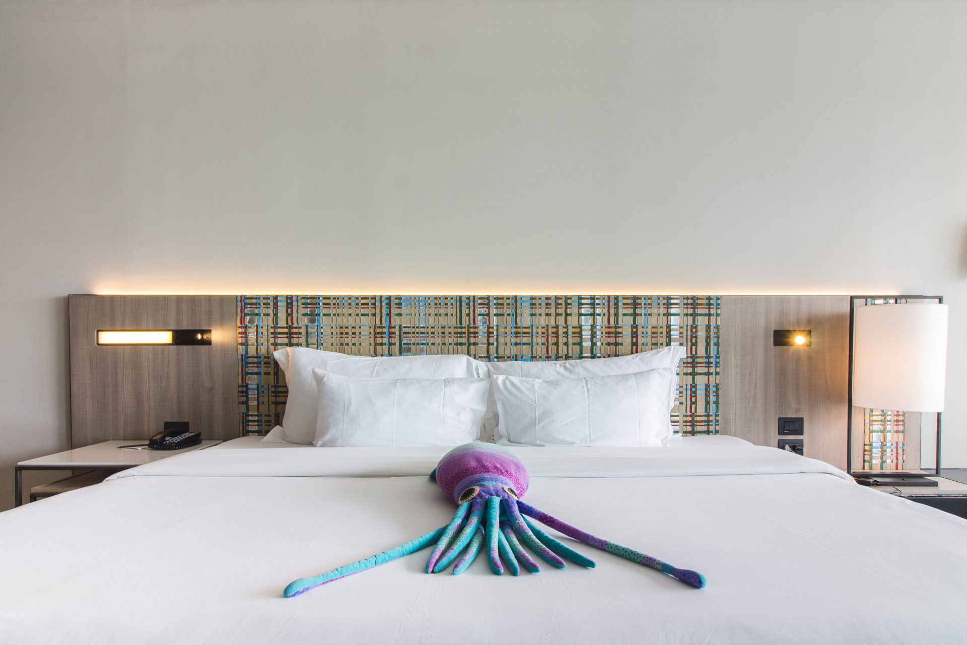 Modern Ocean Front room showcasing soft natural light and uninterrupted sea views, offering a refined beachfront experience in Pattaya.