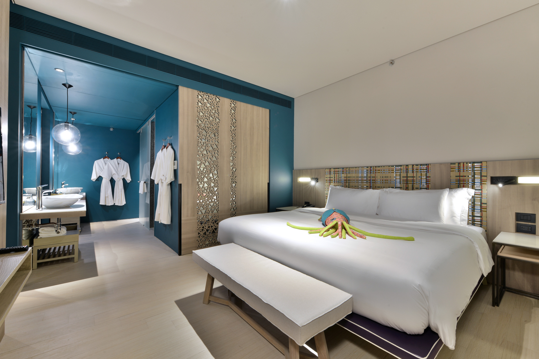 Inviting pool suite with open living space and private swimming pool at a Pattaya Na Jomtien family hotel.