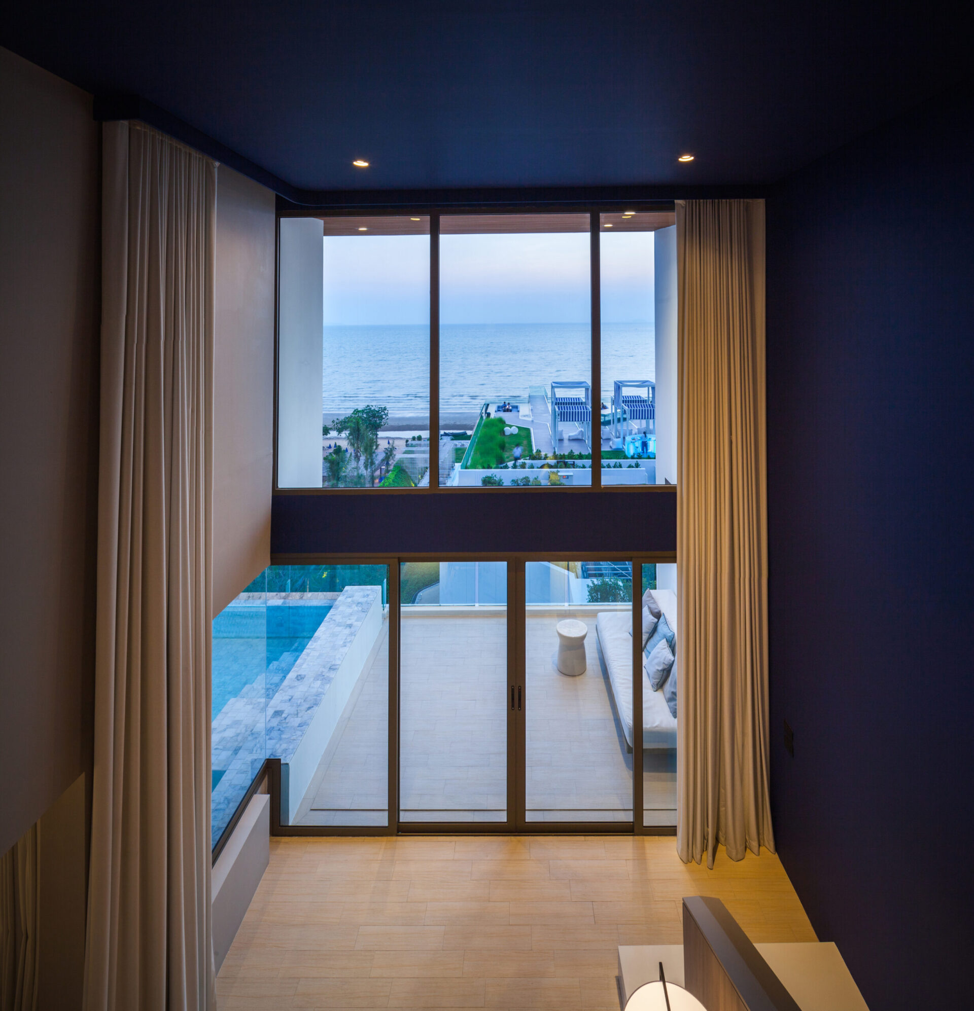 Second bedroom with modern décor and relaxing ambience, ideal for a comfortable group stay in Pattaya.