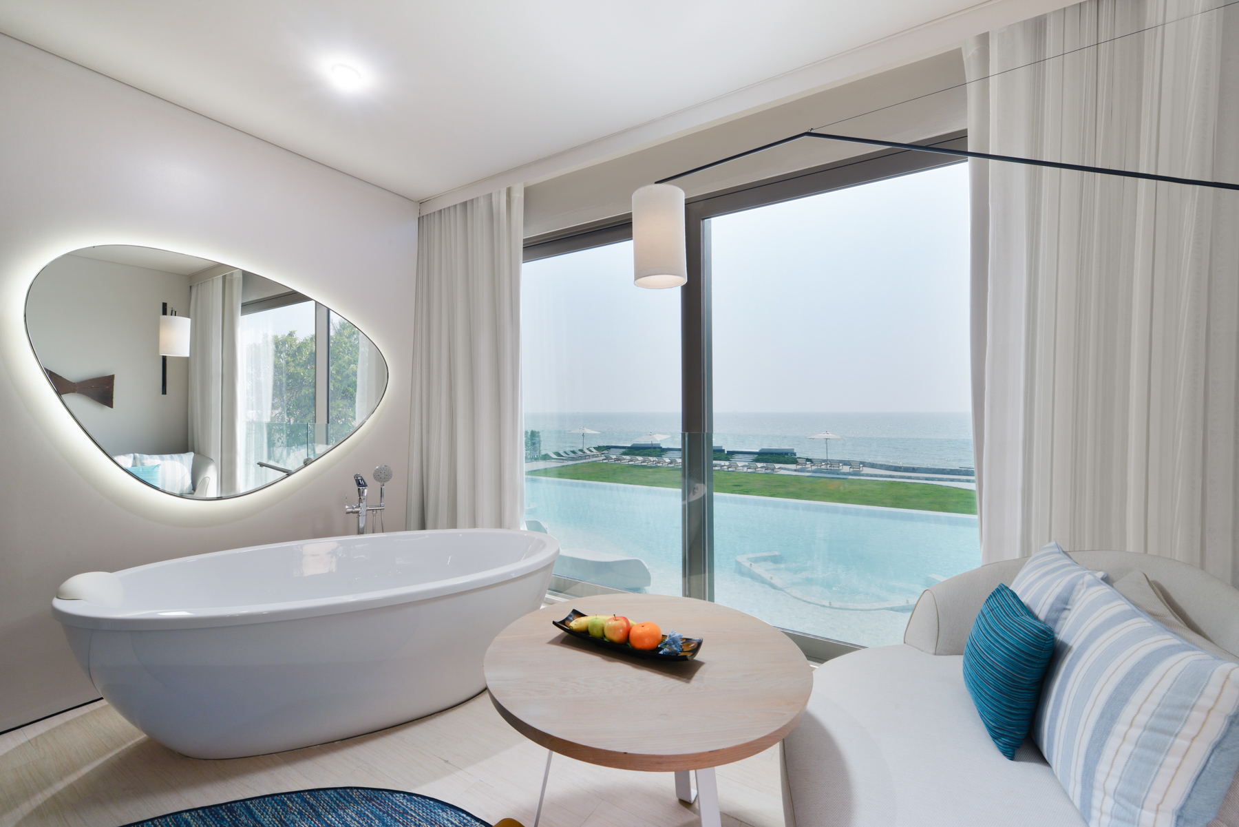 Ocean Front room with a stunning direct ocean view and modern luxury décor, offering a premium stay at a 5-star oceanfront hotel in Pattaya Na Jomtien.