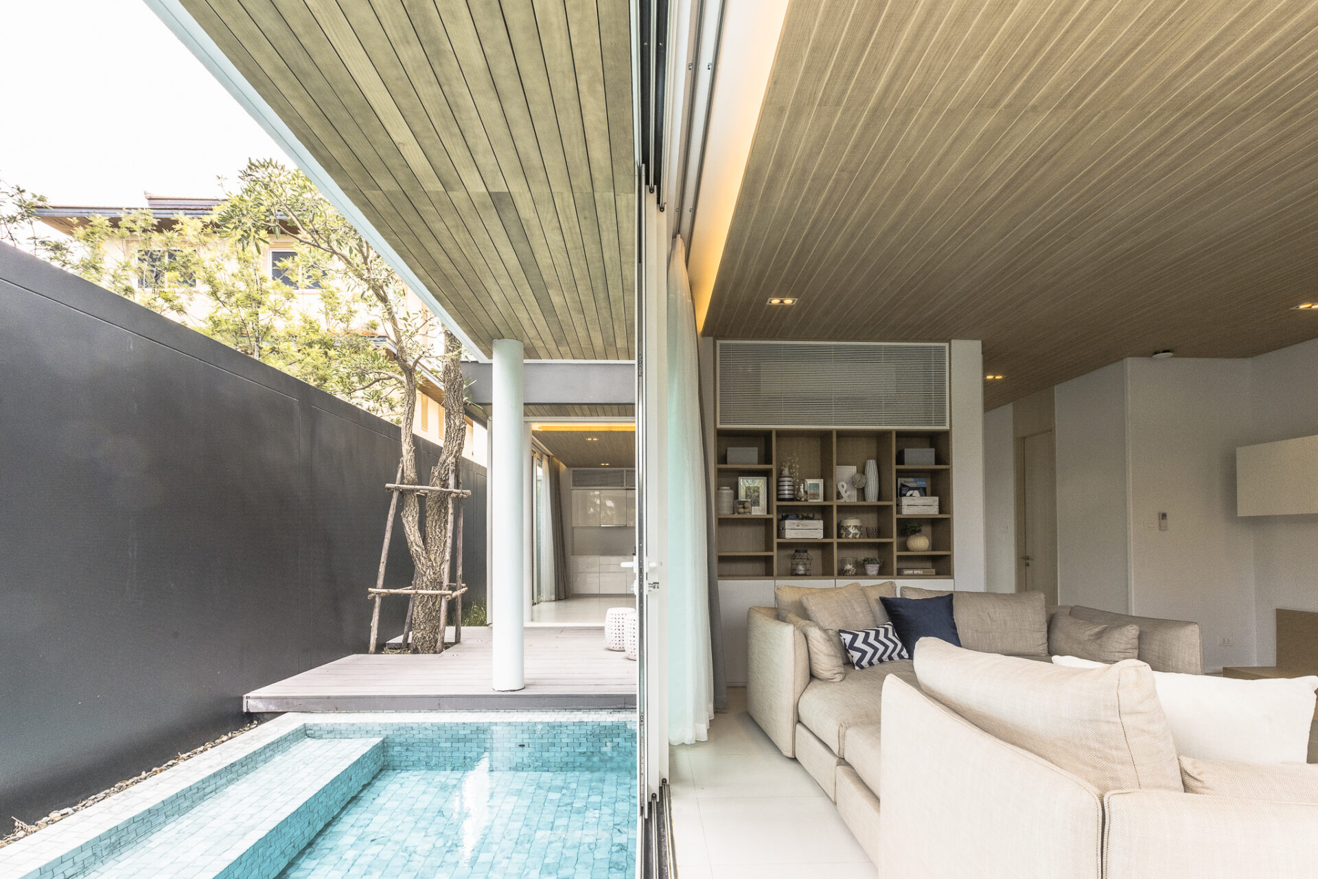 Spacious 3-bedroom pool view villa with modern tropical décor, offering a relaxing family retreat in Pattaya Na Jomtien resort.