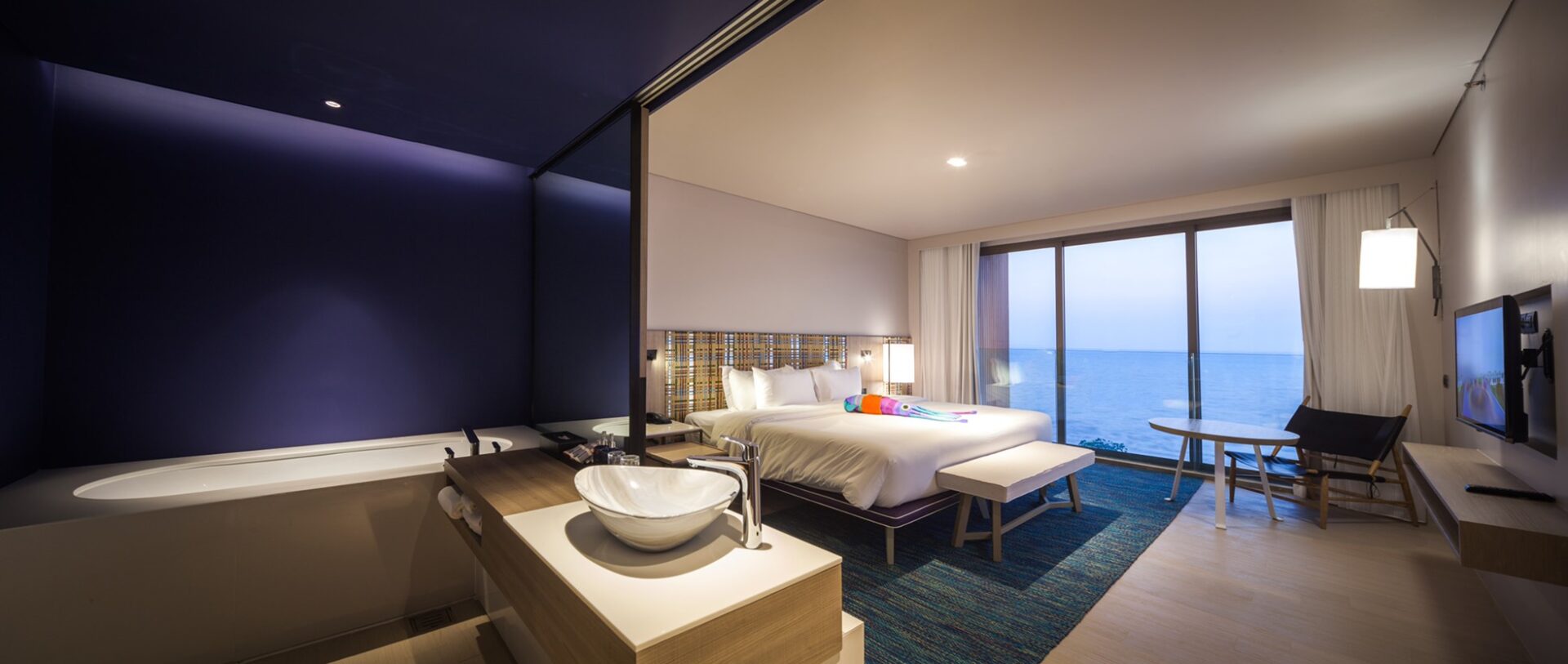 Spacious Sky Pool Villa featuring modern coastal décor and a serene ocean outlook for a luxury villa stay.